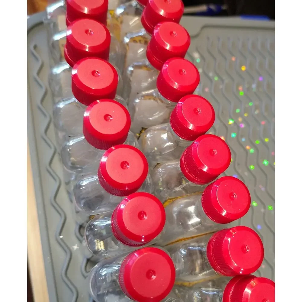 #CR18 - 27 EMPTY AND CLEANED FIREBALL PLASTIC CONTAINERS FOR CRAFTING